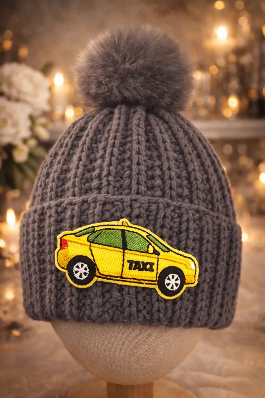 Slate-grey ribbed kids beanie set with yellow taxi patch, sold as a pair.
